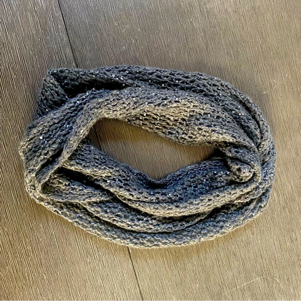 Dark grey infinity scarf adorne with sequins.